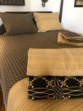 Primitive Stripe Blanket Shown at Foot of Bed